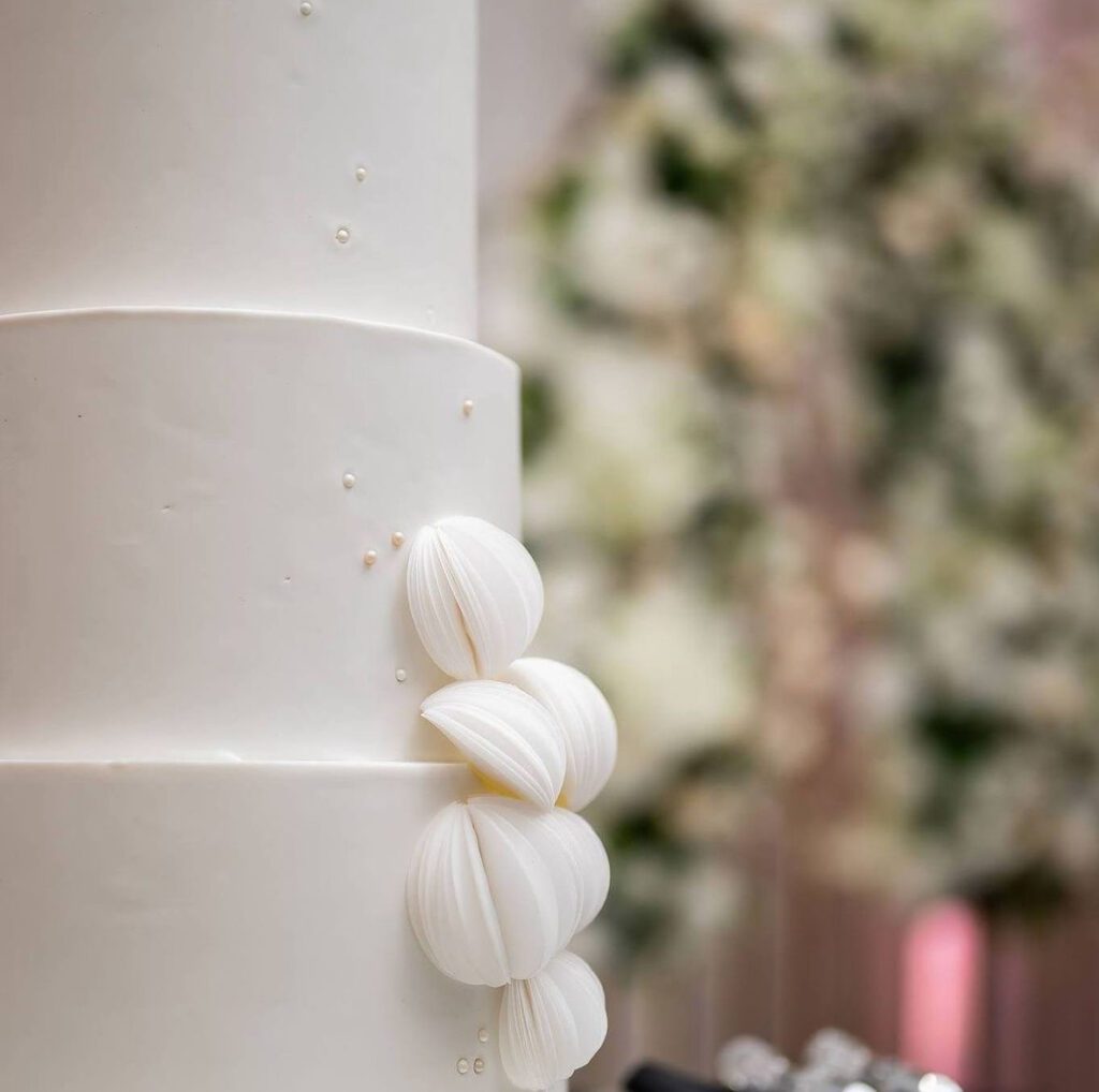 White Wedding Cake With Wafer Paper Flowers by Mimi The Cake Architect
