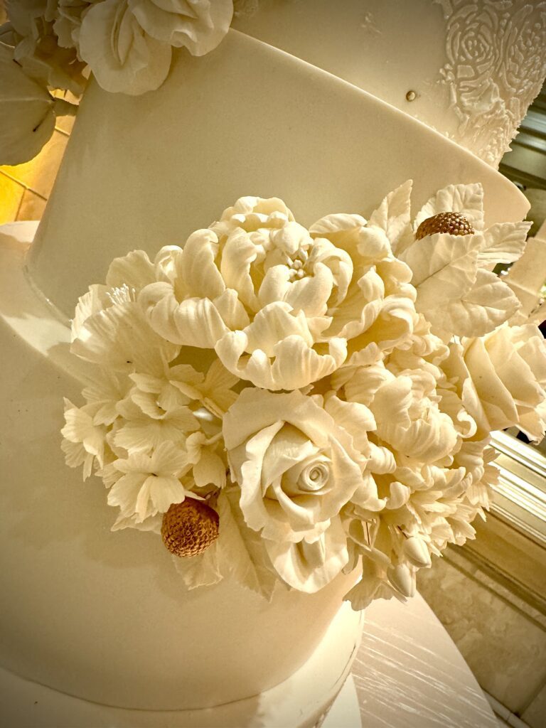 All White Wedding Cake with White Sugar Flowers by Mimi The Cake Architect