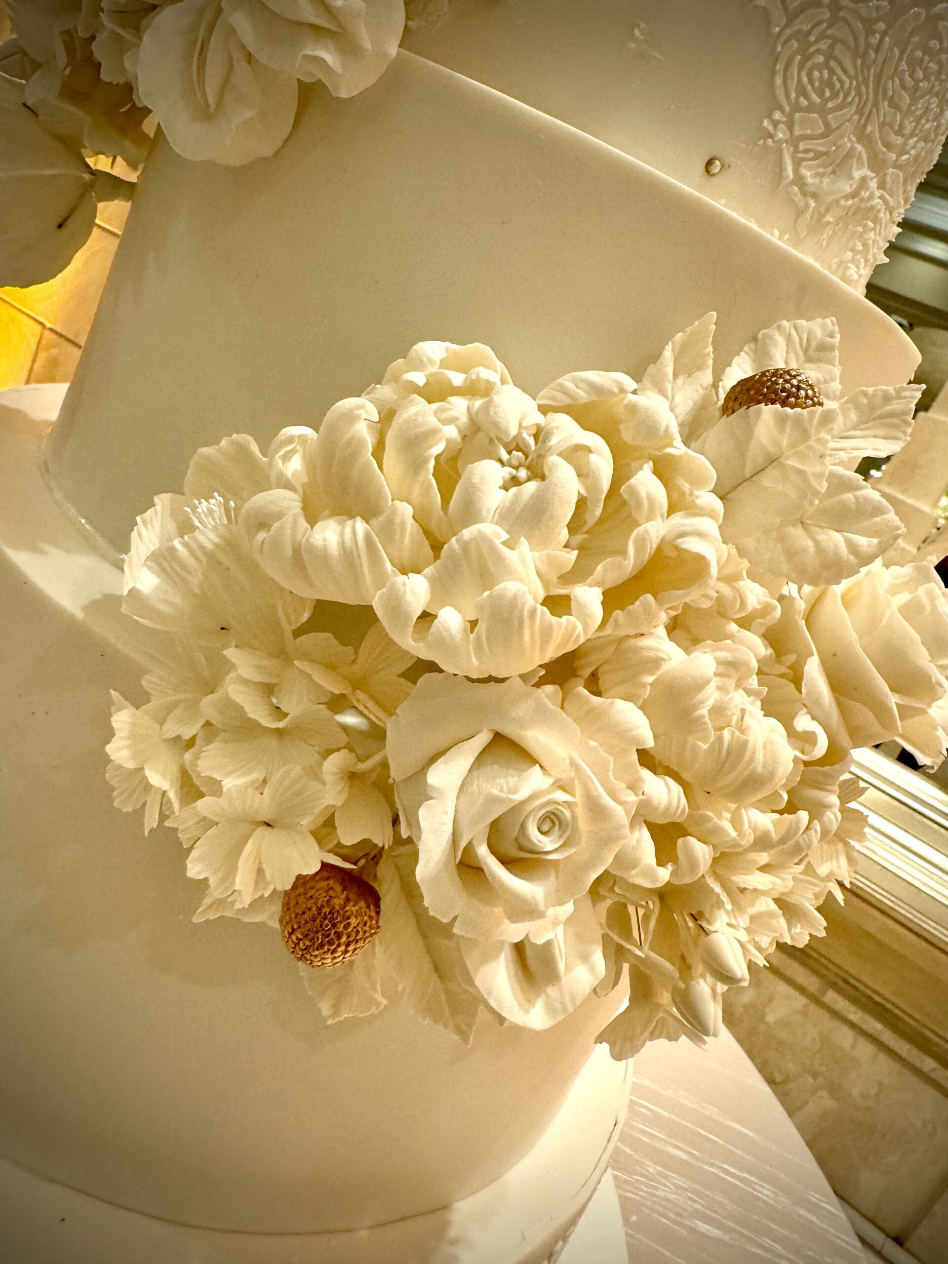 All White Wedding Cake with White Sugar Flowers by Mimi The Cake Architect
